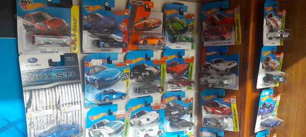 hanging hot wheels on wall